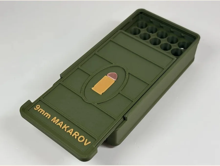 Open 9mm Makarov bullet storage box with ammunition slots